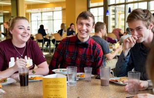 students hanging out together in a dining hall