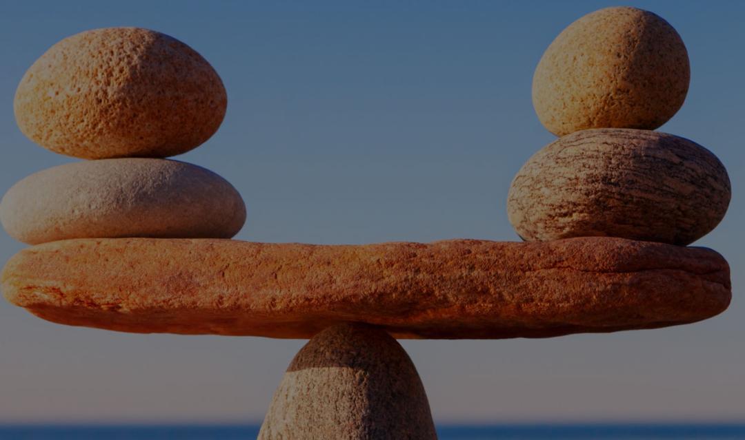 rocks balanced like a scale, representing decision making