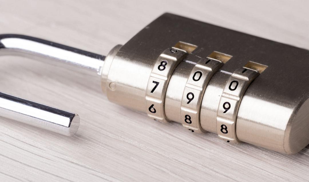 photo of a combination lock, lying on a table