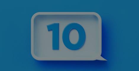 the number 10 written in blue over a white speech bubble