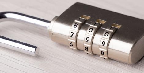 photo of a combination lock, lying on a table