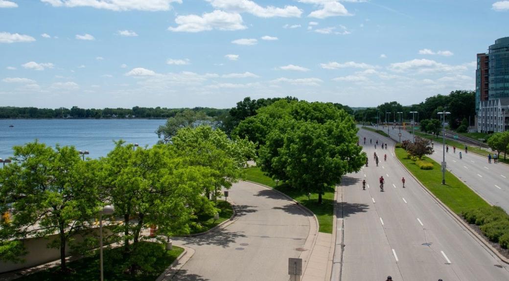 City of Madison, photo of trees and water alongside road