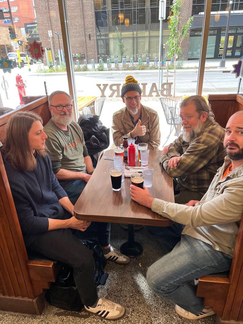 EC team eating lunch together at a cafe