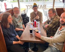 EC team eating lunch together at a cafe