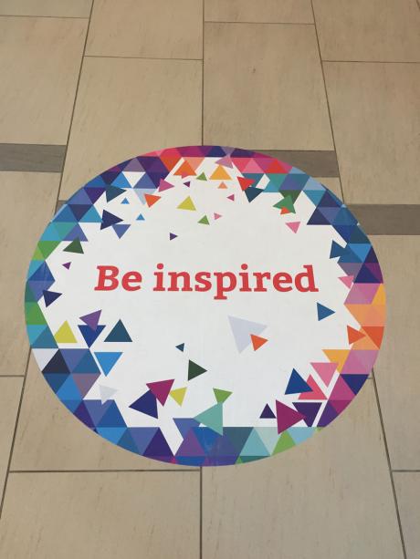 be inspired, image on wall graphic at DrupalCon