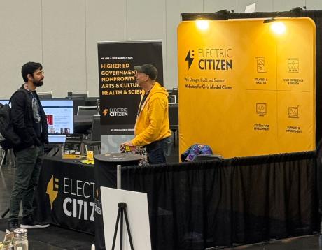Electric Citizen booth at DrupalCon 2024