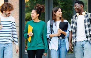 young adult college students talking together outside