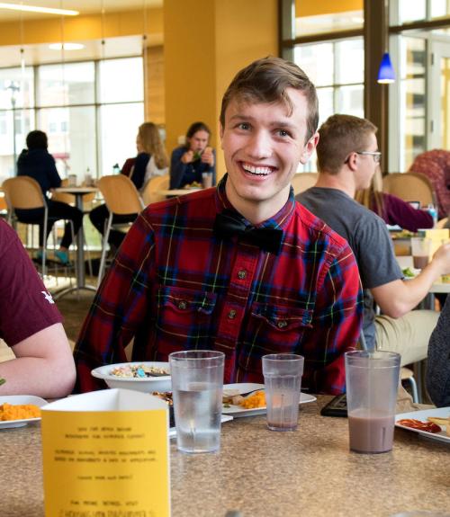 students hanging out together in a dining hall