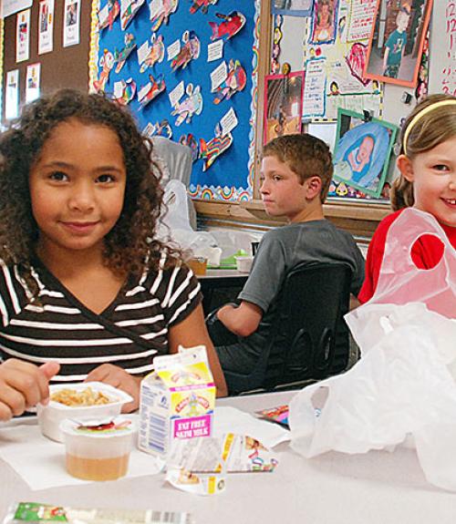 grade school kids in a lunchroom